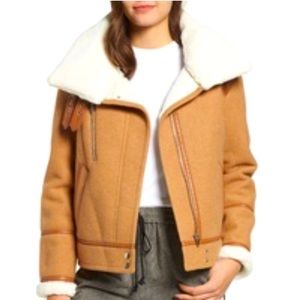 Beautiful brushed Melton wool blend jacket with details at the neckline.